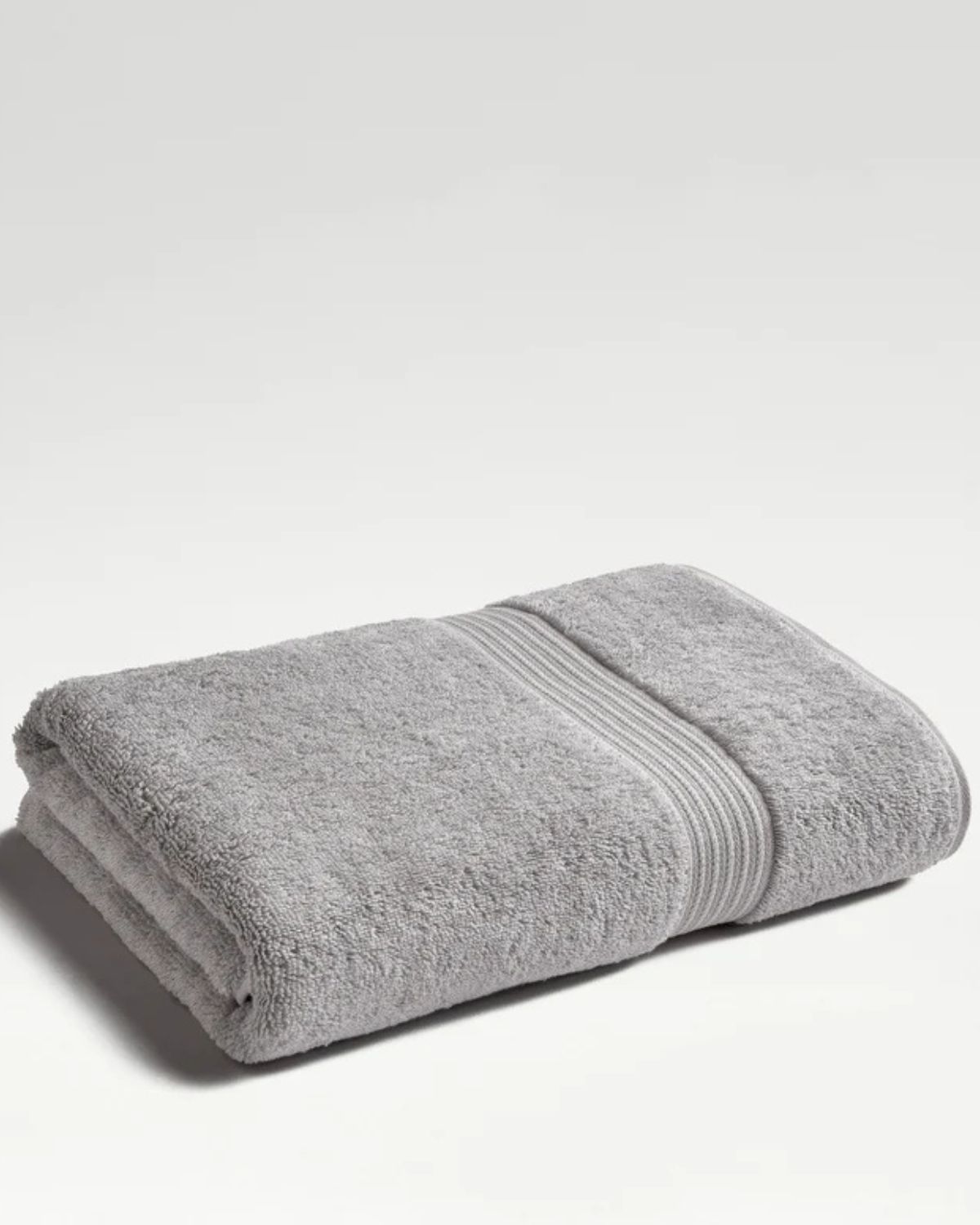 Grå handduk i suprima-ull - premium - Supreme från Christy