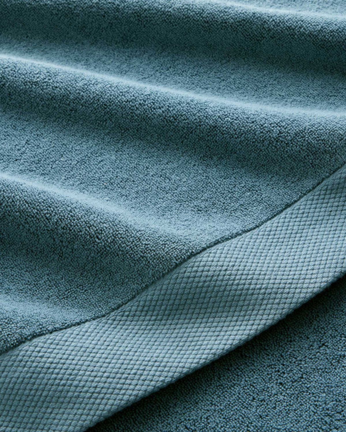 Turkos handduk i 100% turkisk bomull - Premium - Luxe från Christy - närbild Turkos handduk i 100% turkisk bomull - Premium - Luxe från Christy - närbild